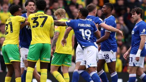 Tempers flare between Norwich and Ipswich players
