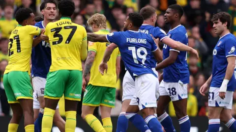 Tempers flare between Norwich and Ipswich players