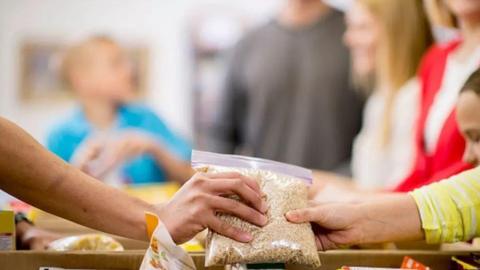 Generic photo of people at a food bank 