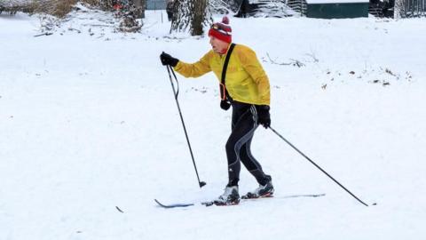 A man skis in Central Park in Manhattan on 27 December 2025