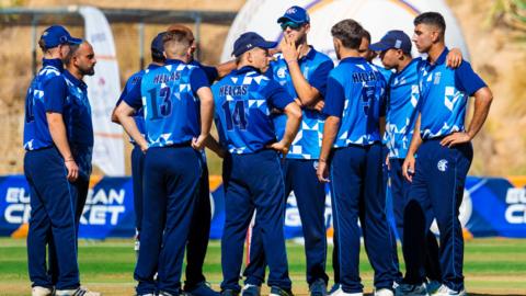 Greece's players comes together to celebrate a wicket at a European Cricket Network event in 2024