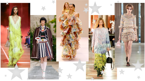 Five pictures of models walking down the catwalk. The first is in a fringed green dress with low v-neck; the second wears a striped pleated midi skirt, shirt and tie, tank top and blazer with brown leather coat draped over her shoulders; the third wears an off-shoulder, ruffled multicolour dress; the fourth wears a head-to-toe tasseled outfit with ombre blue and green effect; the fifth wears a ruffled mulitcolour mini skirt with ruffled three-quarter length sleeve top 