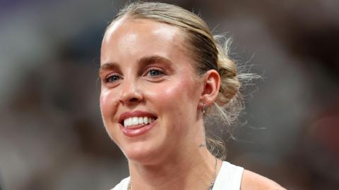 Keely Hodgkinson smiles after securing progress in the women's 800m