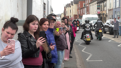Crowds lining the street