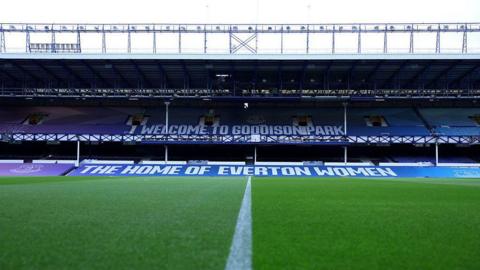A general view of the inside of Goodison Park with a banner stretched across a stand declaring 'The home of Everton Women'