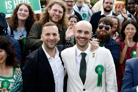 Green Party leader Zack Polanski (L) congratulates the party's newly elected Mayor of Lewisham, Liam Shrivastava, outside the count centre in Lewisham