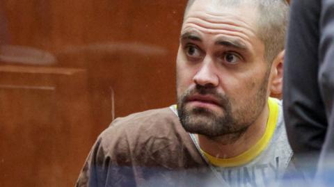 A close head and shoulders crop shows Reiner looking to the right of camera during his arraingment in an LA court on Monday.