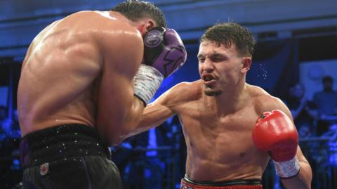 George Liddard lands a right hand on Kieron Conway