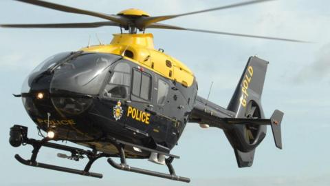 A police helicopter in flight