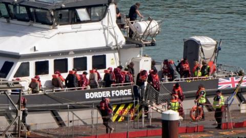 Asylum seekers coming on shore at Dover