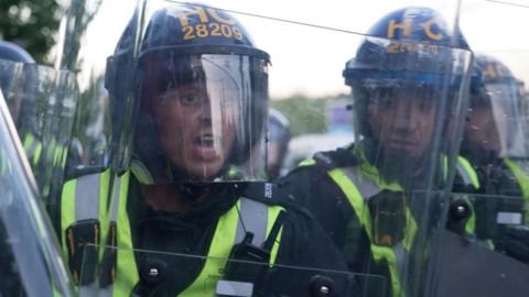 Twp policemen confront protesters in Southampton 