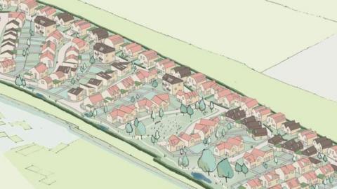 An artist's impression of 150 homes on a long field, surrounded by green fields. There are trees and areas of green space around some of the homes.