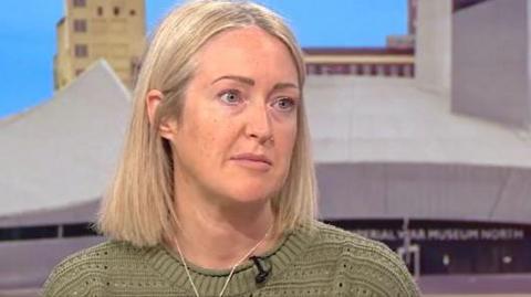 Esther Ghey appeared on 鶹Լ Breakfast, sitting on the couch in the studio in a green jumper looking to the right of the camera, towards the presenters