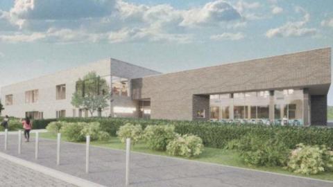 An artist's impression of what a new leisure centre in Leighton Buzzard could look like, with bushes and planting outside 