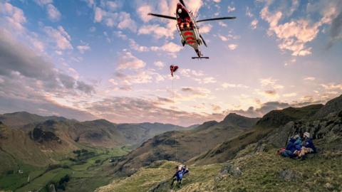 Scene of helicopter winching casualty to safety