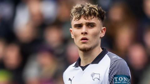 Bobby Clark in action for Derby County during his loan stay with the club
