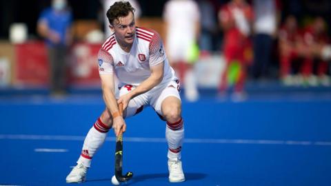 James Albery in action on the hockey pitch for England 