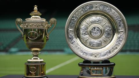 The men's and women's Wimbledon trophies