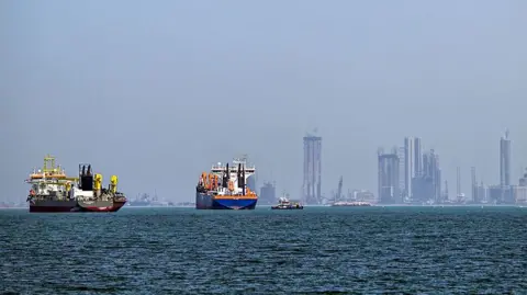 Two commercial vessels offshore in Dubai 