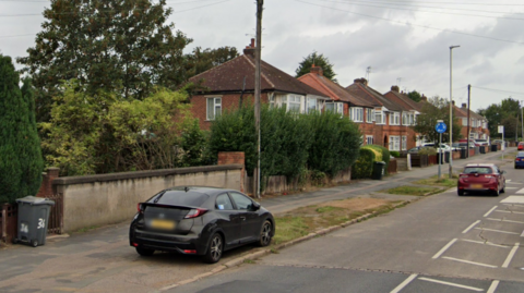 Bridge in Gleneagles Avenue with cars parked nearby