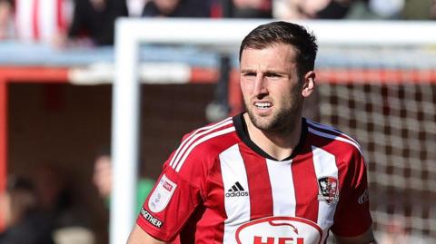 Ben Purrington in action for Exeter City