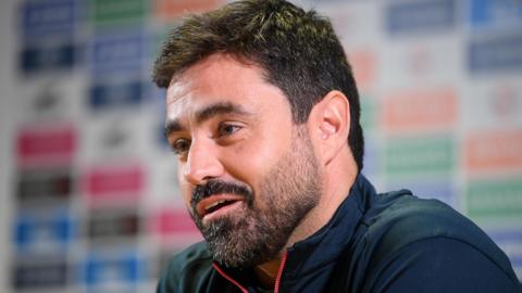 Vitor Matos answering questions at his first news conference as Swansea City head coach