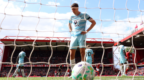 Maxime Esteve of Burnley with his hands on his hips