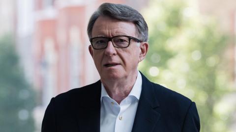 Peter Mandelson seen in a shirt and blazer.