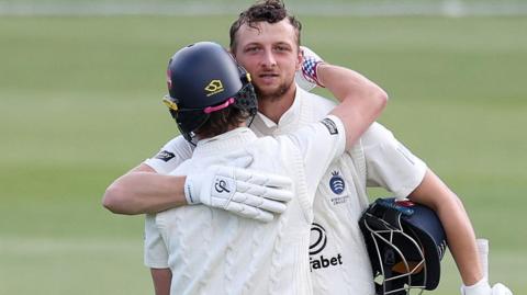 Luke Hollman celebrates century