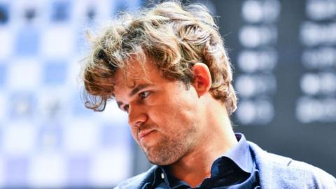 Magnus Carlsen looking pensive during a chess match