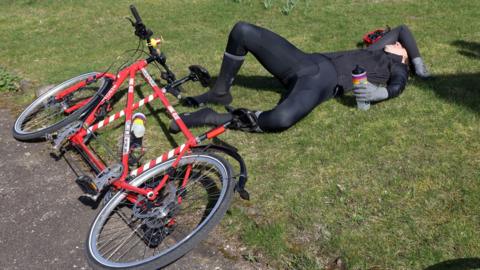 An exhausted Greg James has to take a break on Day 6 of his Longest Ride challenge
