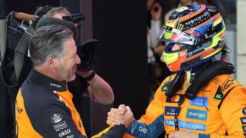 Oscar Piastri and Zak Brown