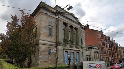 A church building on a street corner
