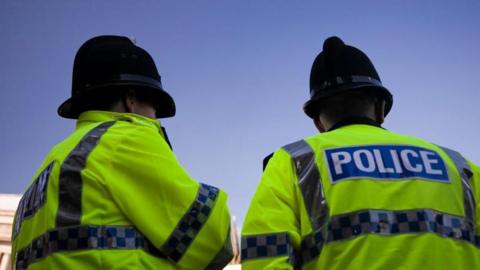 Two police officers in uniform