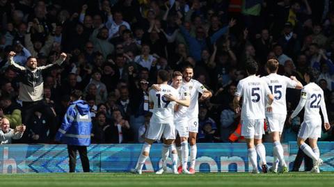 Leeds United celebrate after scoring.