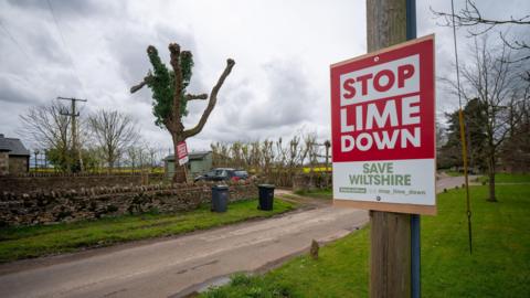 A campaign group's sign against a solar farm