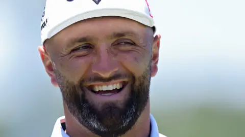 Jon Rahm smiling
