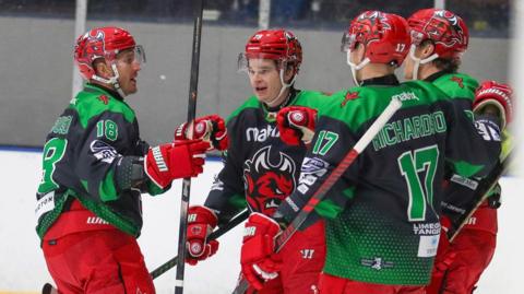 Devils players celebrate in Fife