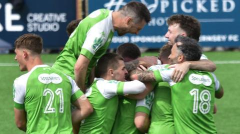 Guernsey FC celebrate scoring in their play-off semi-final