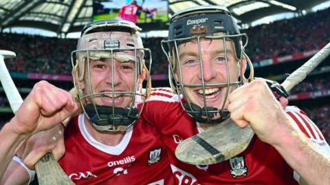 Cork pair Ethan Twomey and Eoin Downey celebrate at the final whistle