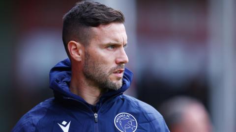 Walsall head coach Mat Sadler watches a recent match