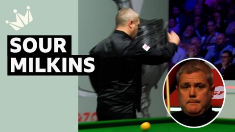 Robert Milkins throws his snooker cue to the ground