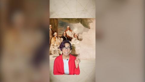 A woman with short brown hair pasted in front of a half-finished painting showing the US Founding Fathers.