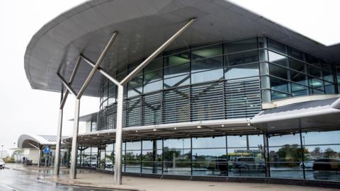 The glass and steel framed exterior of Guernsey Airport