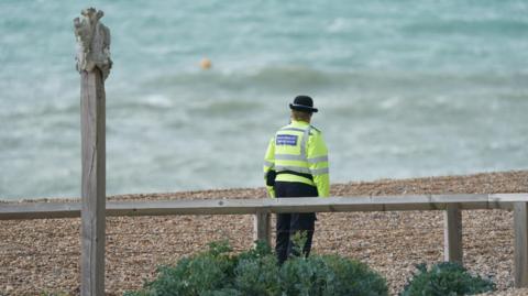 Emergency services at the scene on Madeira Drive, Brighton. The bodies of three women were recovered from the sea in Brighton early today, Sussex Police said. 