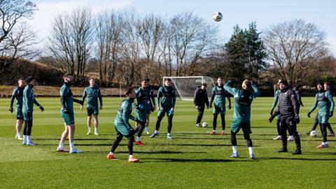 Hibernian players training at the club's training centre in March on a sunny day.