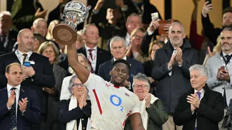 Maro Itoje with the trophy