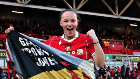 Lili Jones celebrates