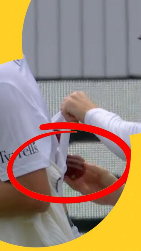 Ollie Robinson gets the ball rubbed on his back
