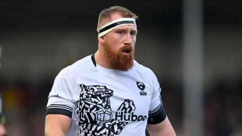 Jake Woolmore standing on the field during a Bristol  match